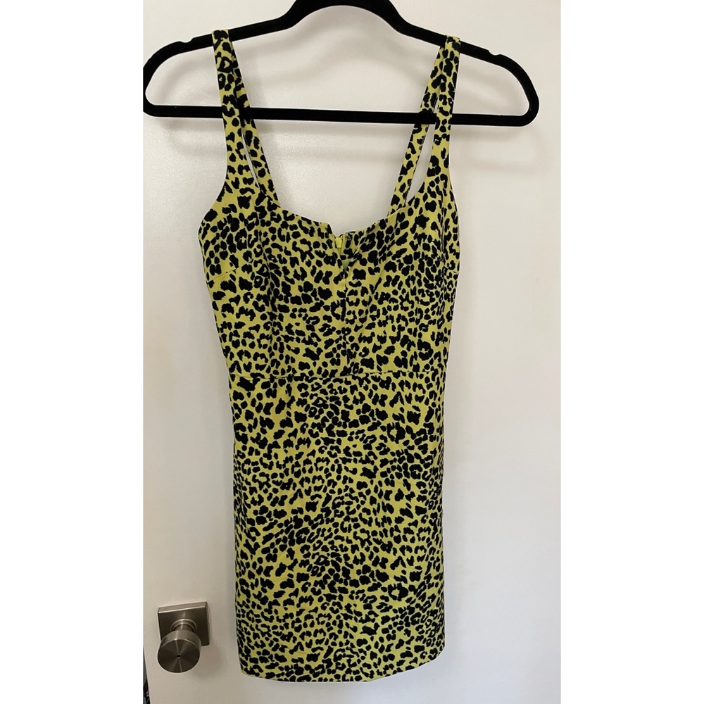 Likely yellow leopard mini dress size 0 sleeveless
